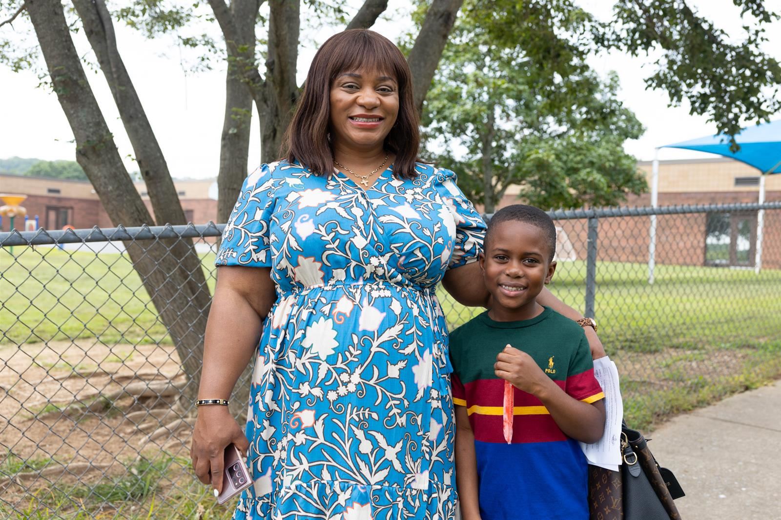 mom and son with popsicle